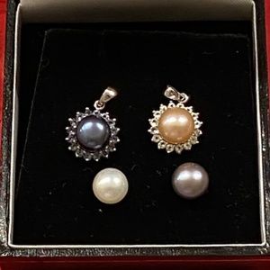 Two sterling silver, freshwater pearl pendants